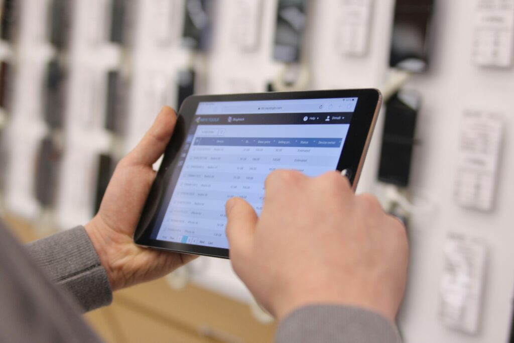 CRM dashboard displaying lead tracking analytics and revenue growth metrics on tablet screen